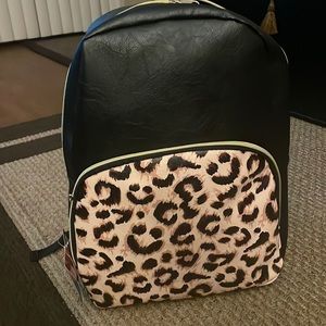 black and cheetah book bag